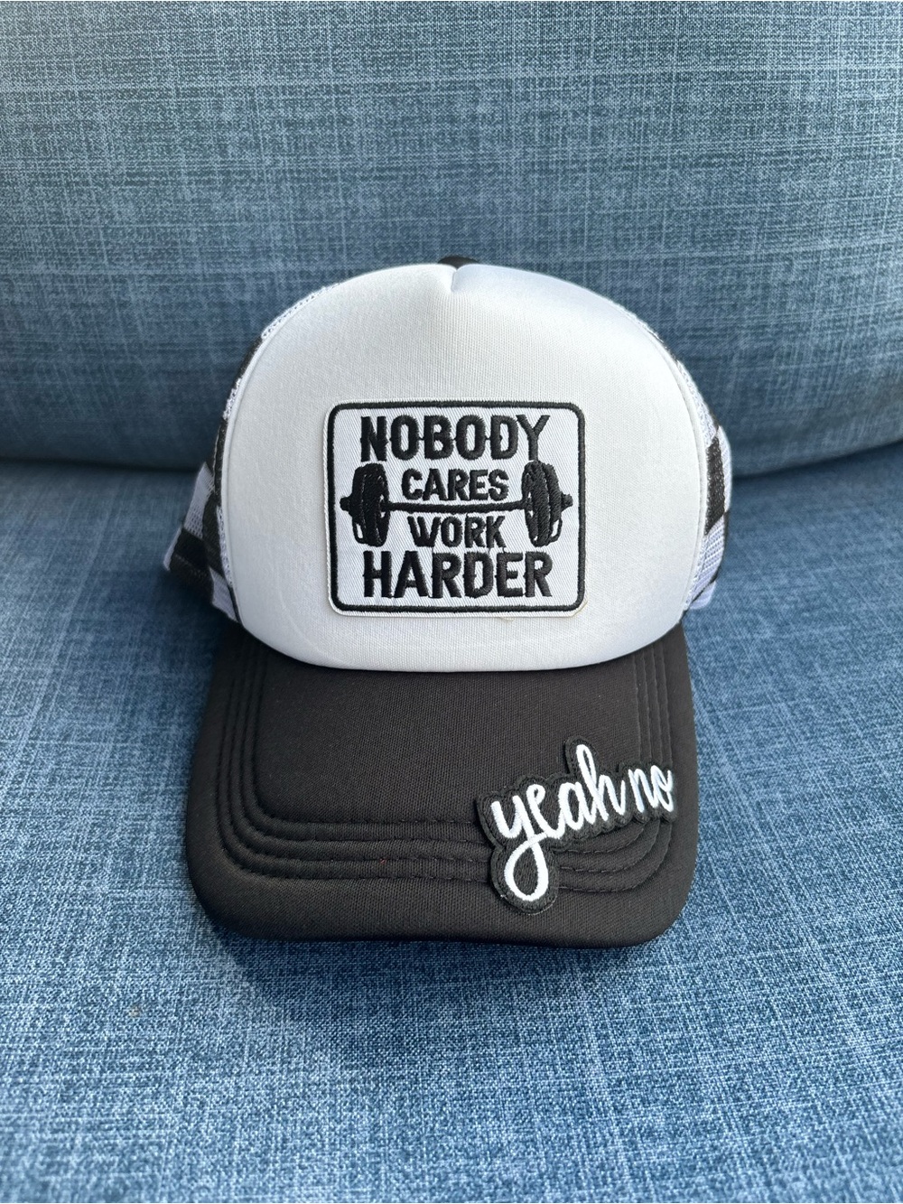 ⭐️Black & White Trucker Hat with 'Nobody Cares Work Harder' Patch